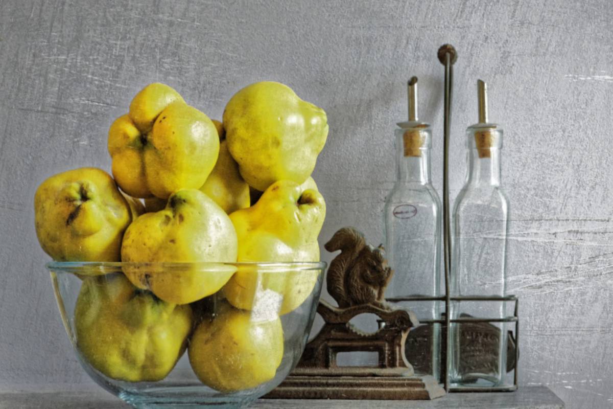 Quince fruit in a basket with spices