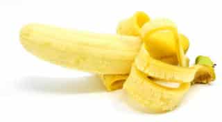 A half-peeled banana ready to eat for its benefits to the body!