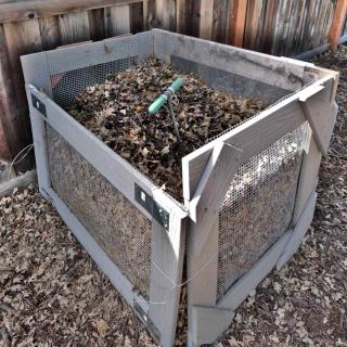 Composter built from planks and mesh wire