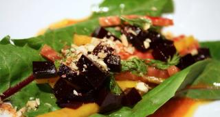 Dandelion leaves as greens with red beet