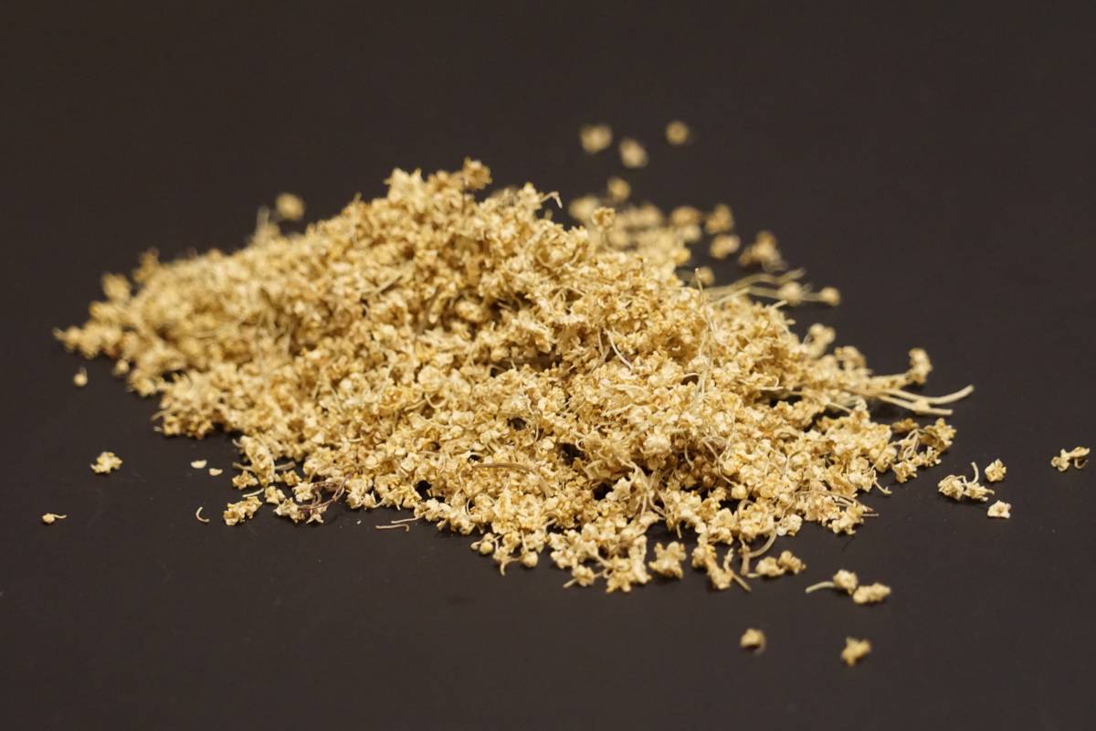 Dried elder flowers on a slate tabletop