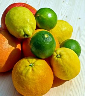 A stack of different citrus fruits