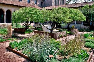 A cloister garden with herbs and prayer.