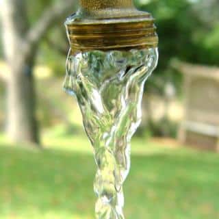 Water running from a faucet in the garden