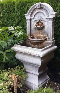 Neat old fountain for a front garden