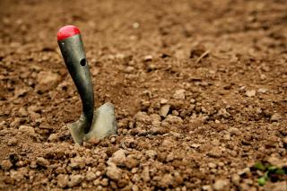 Spade in soil ready for amendments