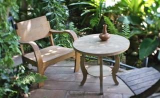 Deck furniture is highlighted with the right patio plants