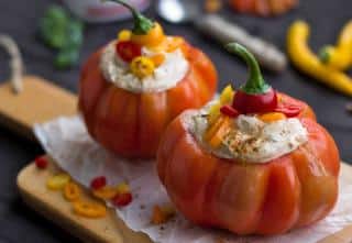 Beefsteak tomato stuffed with a creamy filling for baking