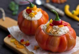 Beefsteak tomato stuffed with a creamy filling for baking