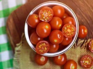 Cherry tomatoes in a small dish for appetizers
