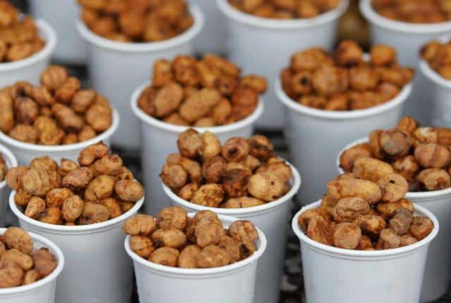 Cups with chufa groundnuts piled inside