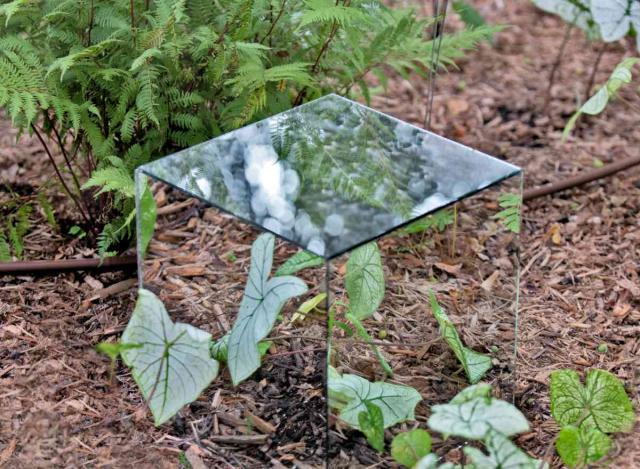 Mirror in a small garden